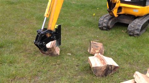 mini digger log splitter uk|mini excavator thumb wood splitter.